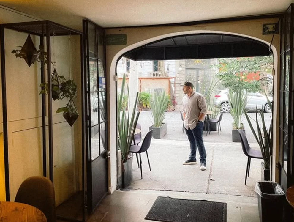 In a café's arched doorway
