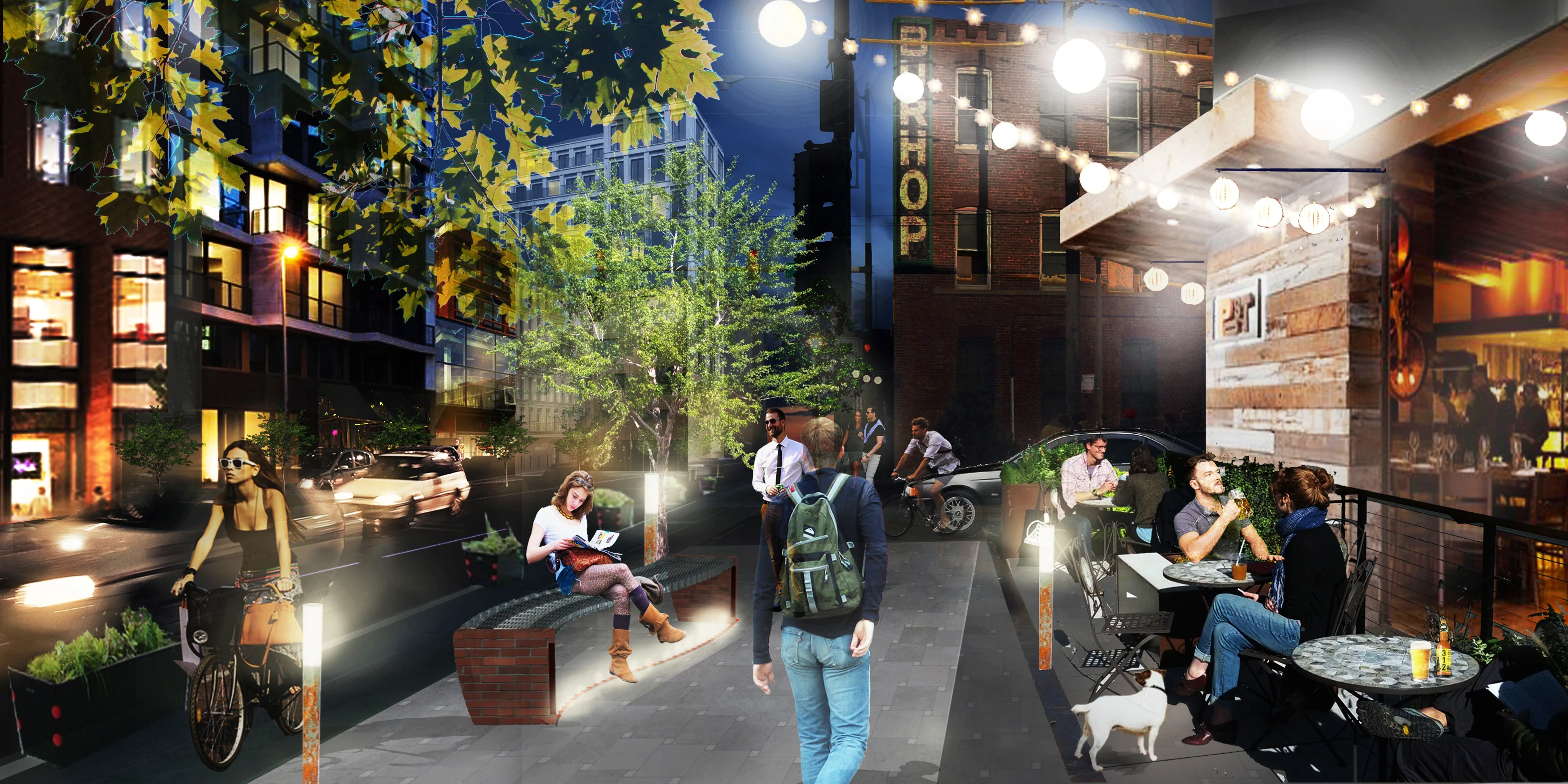 Night perspective of the Division Street mixed-use core: lit storefronts, a café terrace, a bench under a tree and people on bikes